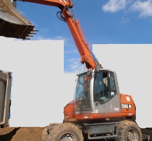 Продаем колесный экскаватор ATLAS 1305 M,  0, 75 м3,  2006 г.в.